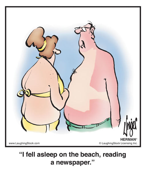 I fell asleep on the beach, reading a newspaper.