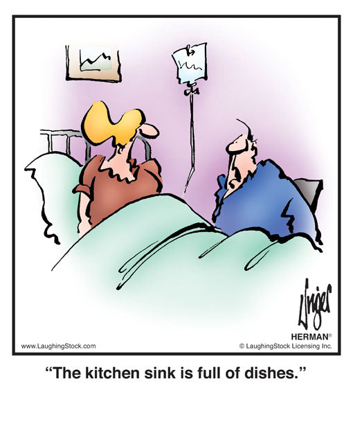 The kitchen sink is full of dishes.