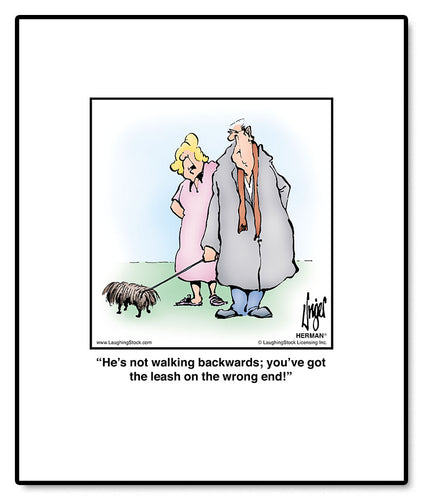 He’s not walking backwards; you’ve got the leash on the wrong end!